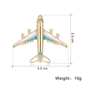 Fashionable enamel airplane brooch in gold, blue and white colors with dimensions