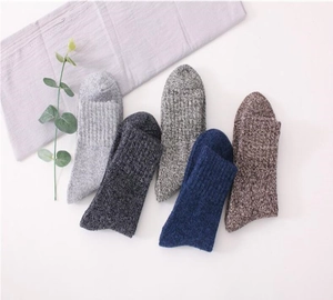Comfortable men winter thick warm wool blend crew socks in assorted colors for cold days.