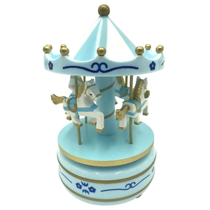 Blue and white carousel music box with golden accents for cake decoration or gift