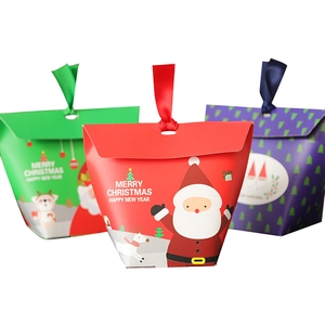 Three colorful Christmas gift boxes with festive reindeer patterns and matching silk ribbons