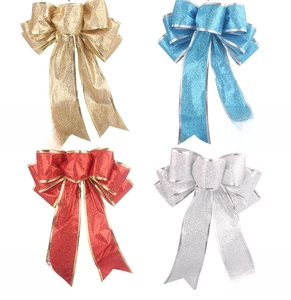 Detail view of 25cm glitter Christmas bows in gold, blue, red and silver colors