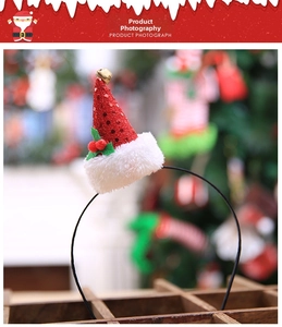 Mini red sequined Santa hat headband with gold bell and holly details for holiday decor