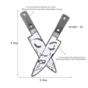 Detail showing dimensions and material of crossed dagger pins in zinc alloy