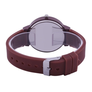 Minimalist quartz watch with brown silicone strap and silver polished back view