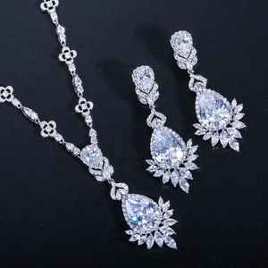 Exquisite bridal zircon necklace and earrings set in silver finish on black backdrop