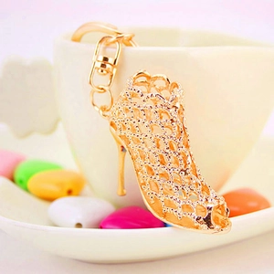 Elegant gold hollow mesh stiletto high heel keychain with crystal accents for women accessories