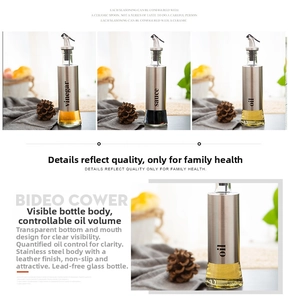Detail of oil and vinegar dispenser set with stainless steel sleeve and non-slip glass base