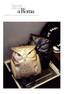 Detailed stitching and texture on owl shaped PU leather backpacks in black and gold