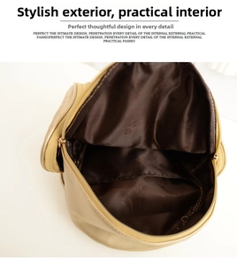 Interior view of champagne gold backpack showing brown satin lining and zip pocket