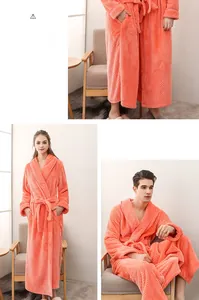 Detailed texture of coral fleece bathrobe with front pockets and waist tie closure