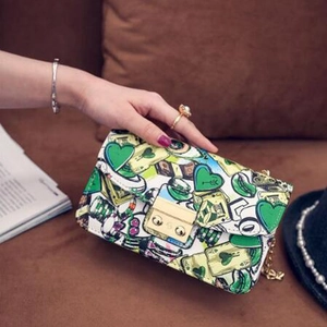 Cute poker pattern crossbody bag with green hearts and gold chain strap for women