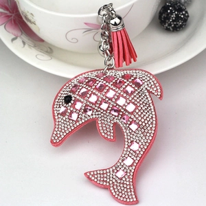 Pink dolphin keychain featuring sparkling glass crystals and stylish leather tassel