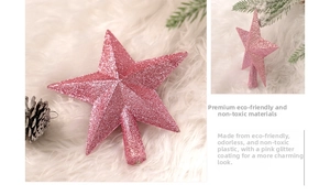 Macro detail of the glittery pink star tree topper showing texture and plastic finish