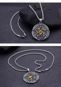 Detailed view of vintage guardian angel necklace with pentagram star and dragon eye inlay