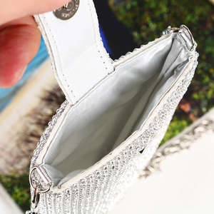 Elegant silver rhinestone crossbody phone bag with chain strap and magnetic buckle