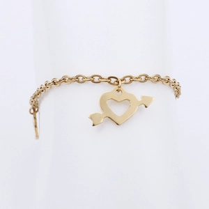 Golden titanium steel heart and arrow anklet for women on a clean white background