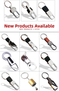 Macro view of assorted leather and zinc alloy keychains with various metal hooks