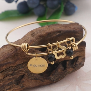 Gold adjustable bangle with I love you mom engraving, heart charm and star pendant