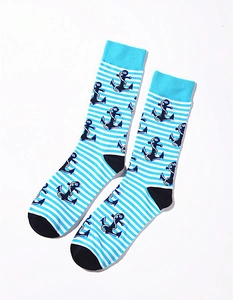Detail of nautical mid-calf socks with blue anchor pattern and reinforced heel and toe