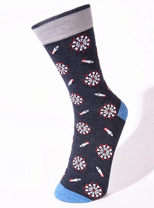Detail of grey knitted mid-calf socks with colorful geometric patterns and blue toes