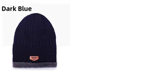 Detail of navy blue knitted hat with brown leather patch and warm fleece lining texture