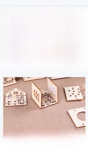DIY Christmas wooden house kit with LED candle, laser-cut pieces and assembly guide
