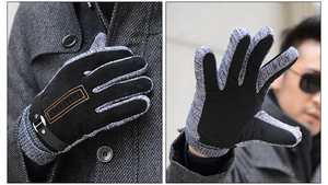 Detail showing the palm side of men's winter gloves with anti-slip grip and leather strap