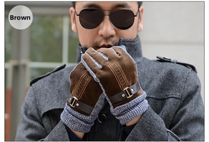 Detail of brown suede men's winter gloves with grey knit stitching and metal buckle strap