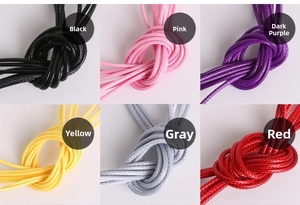 Macro detail of 2mm colorful waxed cords showing braided texture for DIY jewelry making