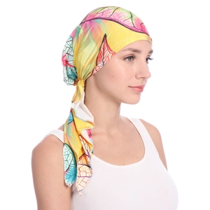 Detail of colorful floral pattern on a soft milk silk turban headscarf for women