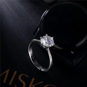 Elegant six-prong solitaire ring with a sparkling round zircon and adjustable silver band