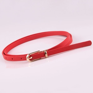 Slim red PU leather waist belt for dresses with a polished gold pin buckle detail