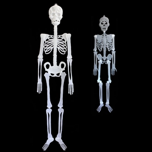 Luminous Halloween skeleton hanging decorations in two sizes on a black background