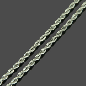 Detailed close-up of 3mm silver twisted rope chain necklaces in polished stainless steel