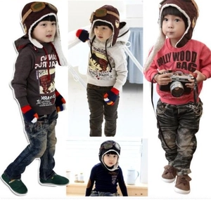 Collage of toddler winter outfit featuring aviator hat, grey sweatshirt and jeans