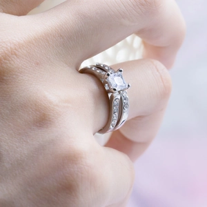 Silver couples ring with square zircon stone and pave diamonds in elegant style