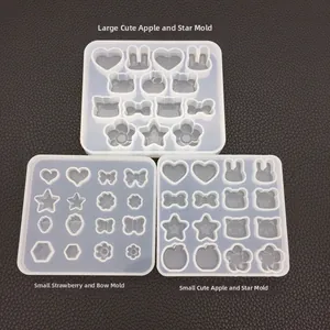 Transparent silicone mold featuring rabbit, strawberry, and star shapes for DIY resin crafts