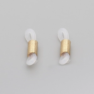 Detail of white silicone anti-slip loops with gold metal coils for DIY eyewear chains