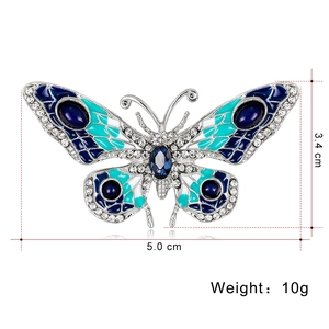 Elegant butterfly brooch in blue enamel and crystals, 5.0 x 3.4 cm, weight 10g