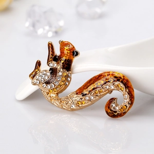Elegant gold-tone squirrel brooch with amber enamel and sparkling rhinestones