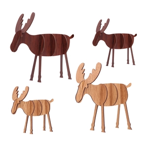 DIY wooden reindeer ornaments in dark and light wood finishes for Christmas desk decor