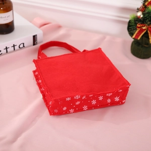 Sacchetto regalo di Natale in feltro rosso con fiocchi di neve e manico robusto