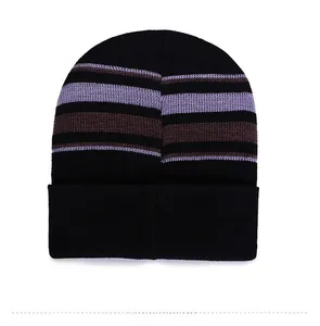 Detail view of the back of a striped knit beanie with warm fleece lining and fold cuff