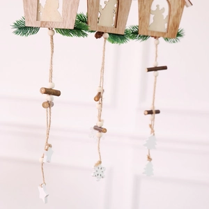 Close-up of wooden Christmas ornaments with snowflake patterns and rustic jute twine