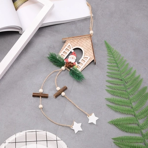 Christmas wooden house ornament with Santa pattern, pine needles and pine cones