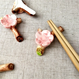 Japanese style ceramic cherry blossom chopstick rest set with wooden utensils