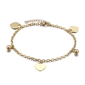 Elegant gold chain anklet featuring heart charms and beads with adjustable clasp