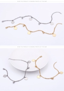 Detail of adjustable heart anklet with polished beads in gold and silver finishes