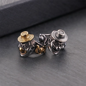 Gothic punk clown rings in silver and gold tones with vintage textured finish