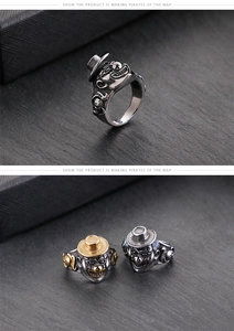 Detailed relief of a joker face and gothic patterns on a titanium steel ring